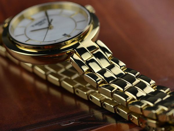 Tissot Flamingo Mother of Pearl White Dial Gold Steel Strap Watch For Women - T094.210.33.111.00