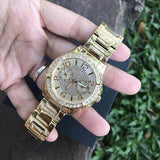 Guess Sassy Analog Quartz Gold Dial Gold Steel Strap Watch For Women - W0705L2