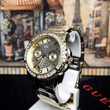 Guess Sassy Analog Quartz Gold Dial Gold Steel Strap Watch For Women - W0705L2